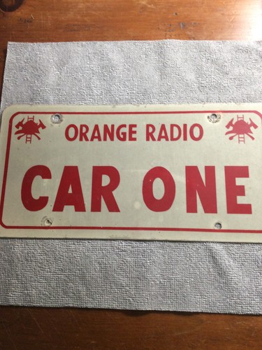 #695 Orange Radio Car One License Plate