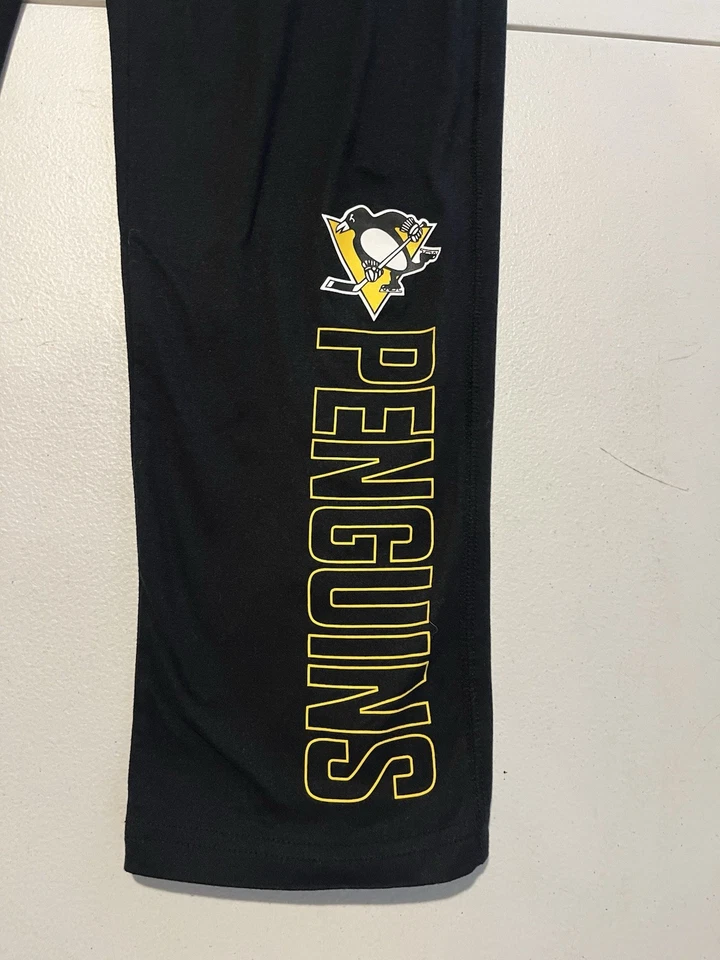 Leggings Fanatics NHL Pittsburgh Penguins para mujer con logotipo negro y dorado, talla L Foto 2 de 4