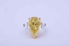 10.11 Carat Center Fancy Yellow Pear Cut Citrine  Two White CZ Three Stone Ring