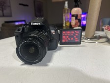 Canon EOS Rebel T5i Battery And Strap Are Included