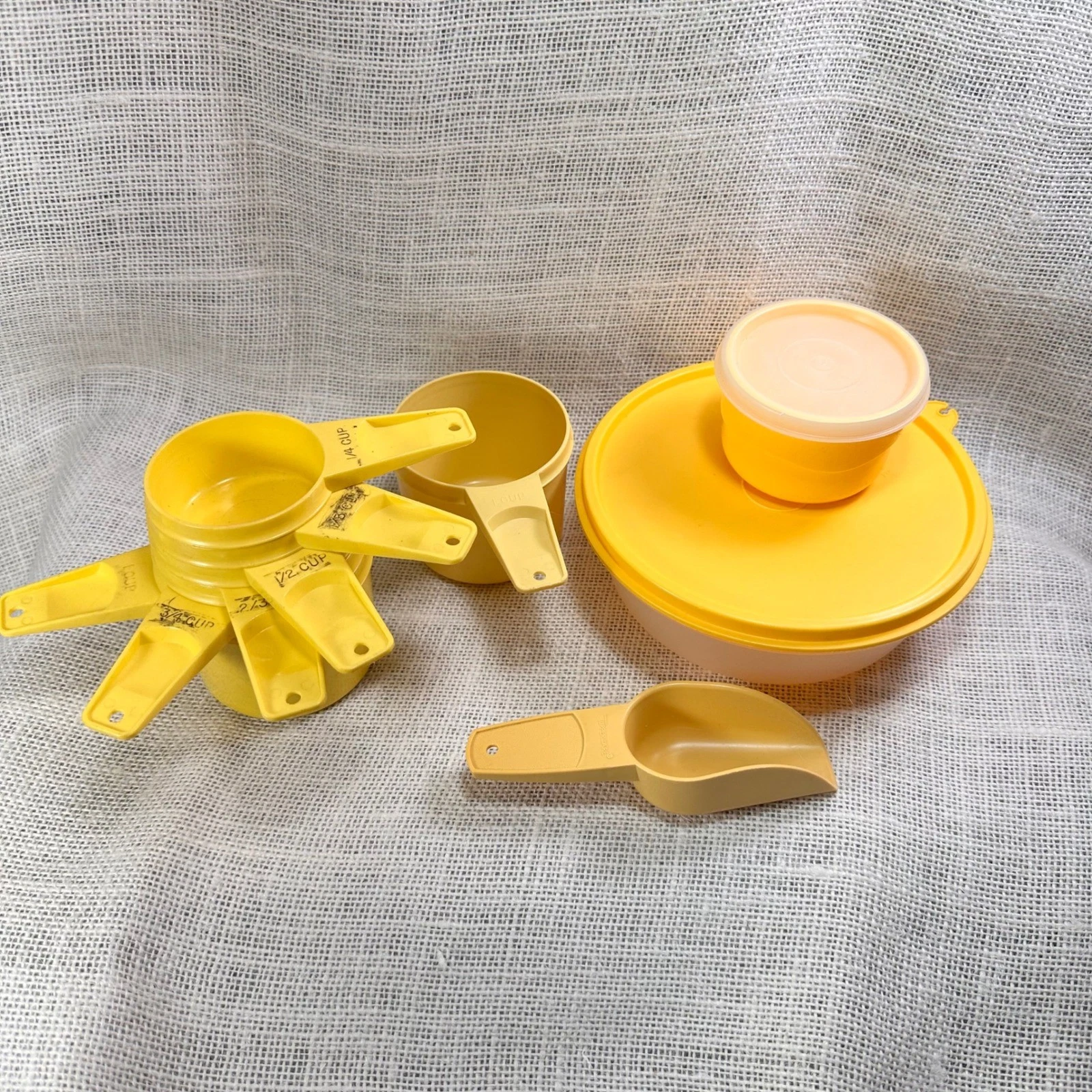 Vintage Tupperware Harvest Yellow Measuring Cups Scoop and Lidded Bowls Set
Opens in a new window or