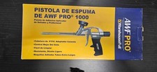 AWF Pro 1000 professional spray foam gun with foam and gloves.
