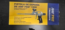 AWF Pro 1000 professional spray foam gun with foam and gloves.