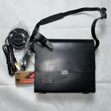 Vintage BELL AND HOWELL Black Faux Leather Movie Camera Case And Extras