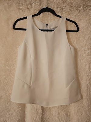 Cabi Size XS White Sleeveless Zip Back Shell Top Fitted Very Well With Stitching