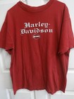 Red vintage T-shirt with white “Harley-Davidson” text and logo, men’s XL, USA made.