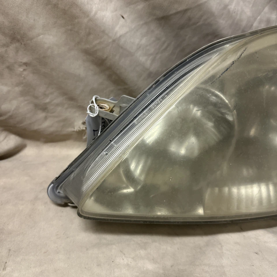 Faro halógeno izquierdo Toyota Matrix 2003-2008 OEM O9572 DW Foto 2 de 4