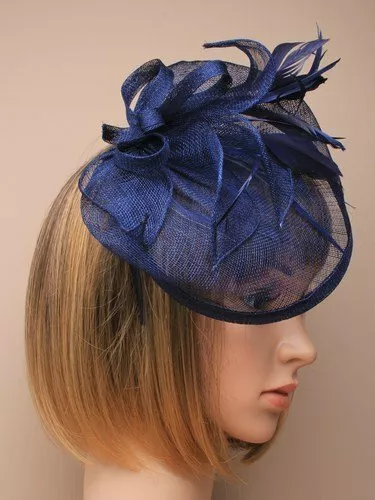 Navy blue fascinator with hessian hat petals loops and feather