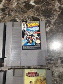 Lote de 8 juegos Nintendo NES TMNT Operation Wolf X-Men Off Road Batman Rambo y m&aacute;s