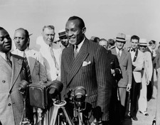 American athlete Jesse Owens meeting members of the press on arriv- Old Photo
