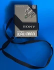 For PARTS or REPAIR- Sony Walkman WM-2 Cassette Tape Player & Belt Clip VNTG 80s