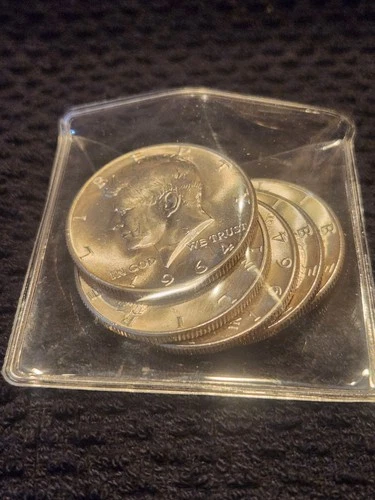 1964 Kennedy Half Dollars   2.50 Face Value. Uncirculated Condition