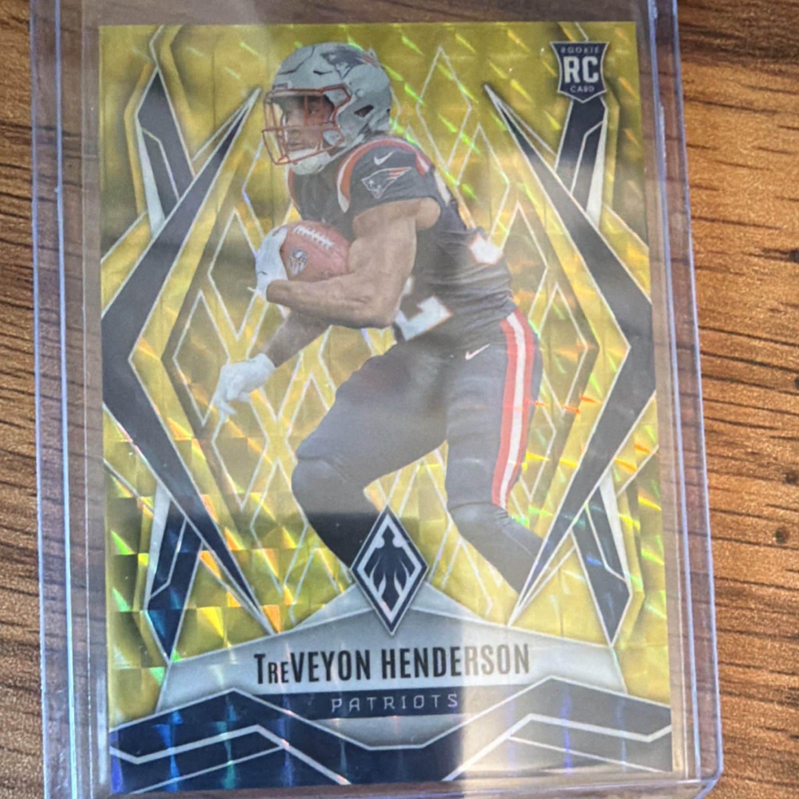 2025 Panini Phoenix TreVeyon Henderson #187 Yellow Pyramids /185 Patriots