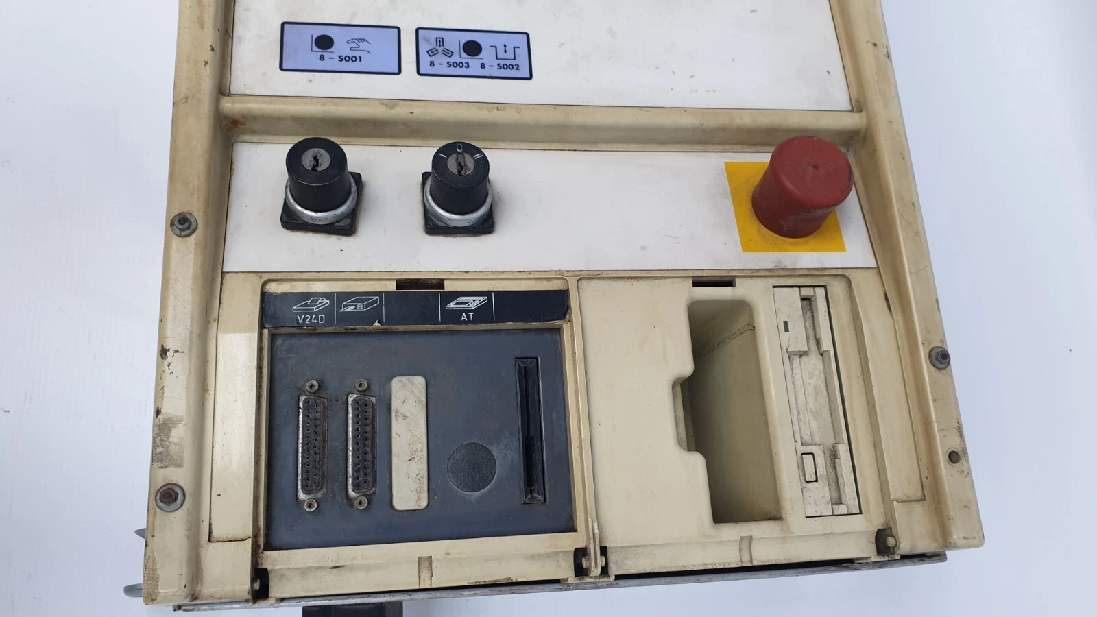 Emergency stop, two key switches, floppy drive and V24D / AT port panel