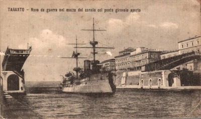 Taranto warship in the middle of the canal with bridge g. F. small shipped