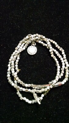 BCBGeneration Silver-tone Stretch Bracelet Angel Wing Charm Enjoy the Journey