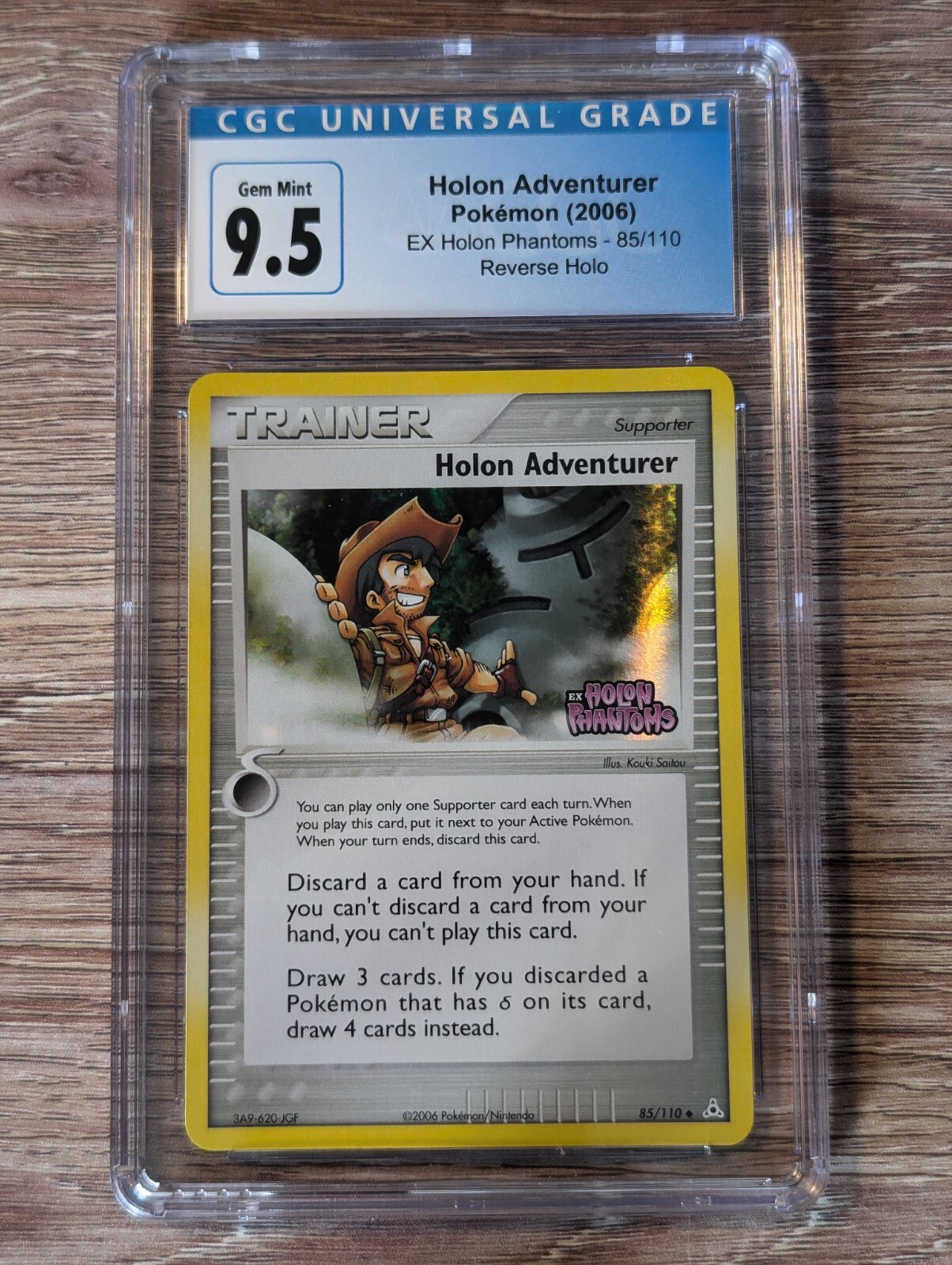 2006 EX Holon Phantoms Holon Adventurer Reverse Holo #85 CGC Gem Mint 9.5/10