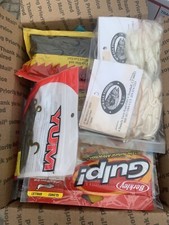 Medium Flat Rate Box Filled With Packaged Plastics Worms Lizards Tubes