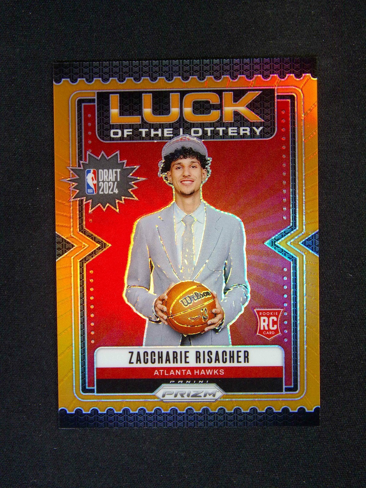 2024-25 Panini Prizm Zaccharie Risacher #10 RC Luck Of The Lottery Orange /49