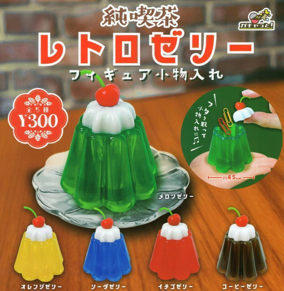 A full gacha set of transparent jelly mini cases with kawaii mascots inside — collectible, tactile, and weirdly satisfying to look at.