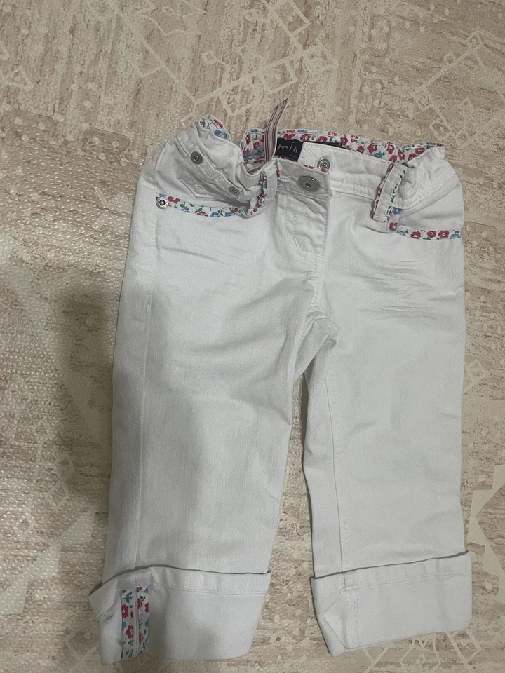 Jeans Capri Mini Boden Niñas Blancos Recortados Enrollables 5 Años Flor Ajustable Foto 4 de 4