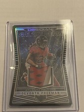 2018 Panini Obsidian Galaxy Gear Relics Electric Etch Orange /50 Devonta Freeman