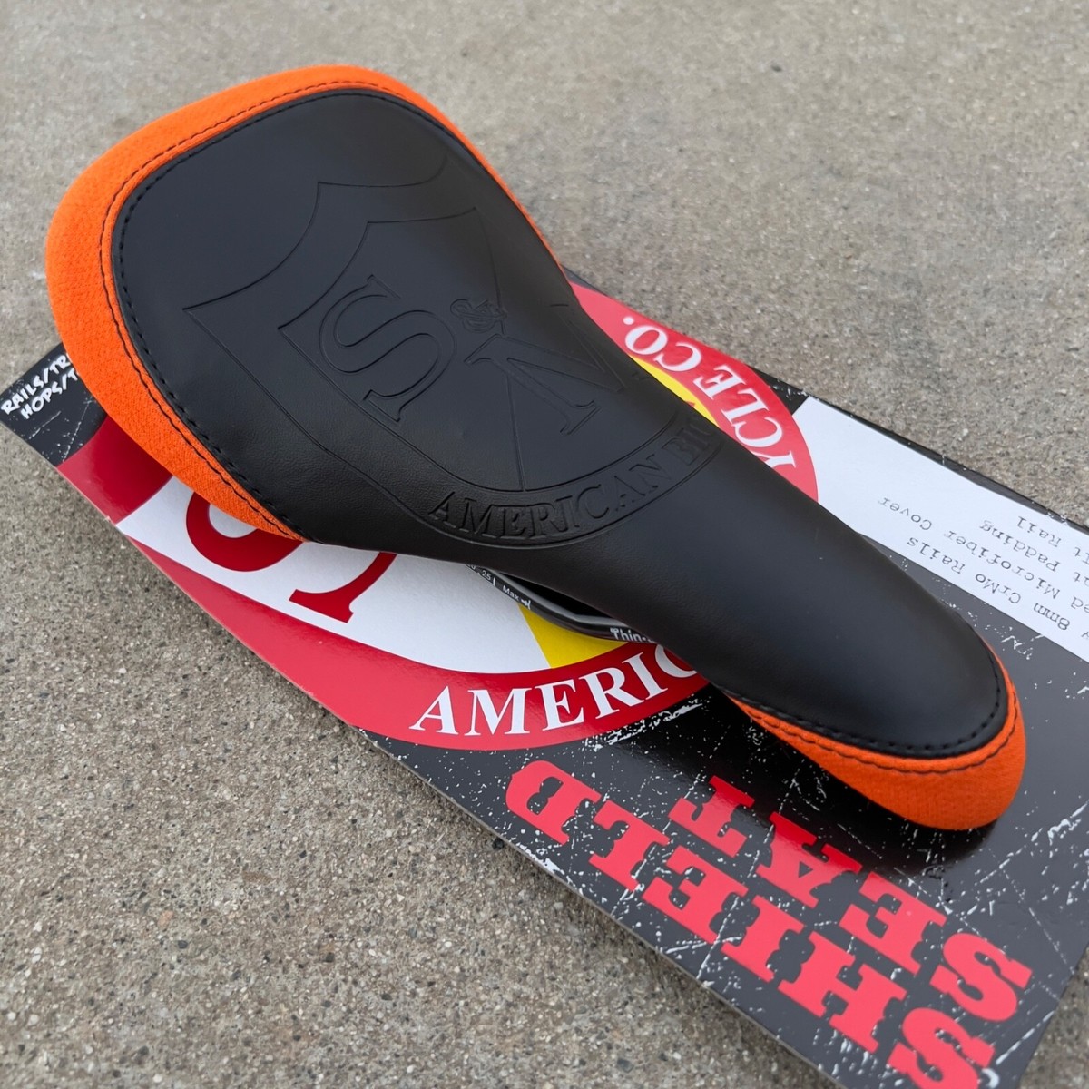 S&M BMX SHIELD THIN RAILED SEAT BLACK/ORANGE SUNDAY PRIMO CULT