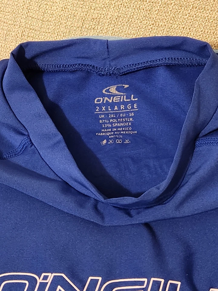 Top protector contra erupciones 2XL azul manga corta O'Neil para hombre Foto 3 de 4