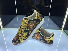 Zapatilla deportiva unisex Tomson Lee Gold Lion de caña baja