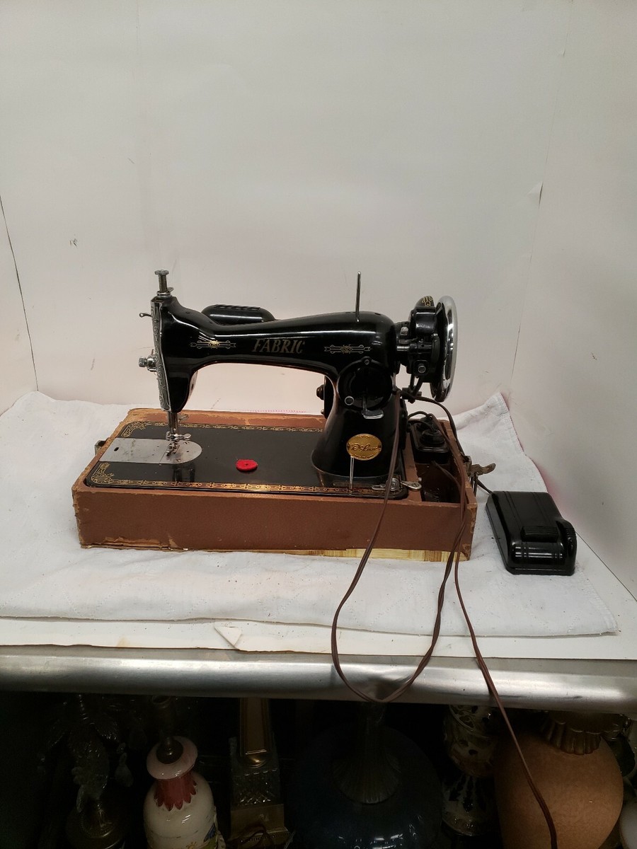 Vintage DeLuxe Brand Fabric Sewing Machine, New York Vintage DeLuxe Brand Fabric Sewing Machine, New York