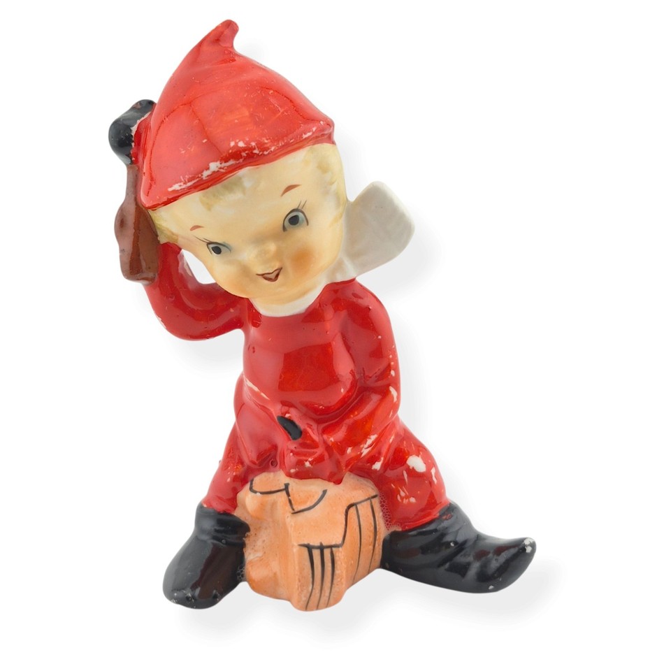 A 1950s Japan-made pixie elf dressed as a baseball catcher in salt & pepper form — this is the peak of mid-century sports kitsch.