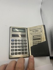 Vintage 1981 Texas Instruments TI-1766 Solar Pocket Calculator w/ Case & Manual