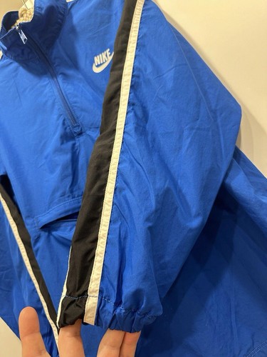 Chaqueta cortavientos Nike Sportswear juvenil grande (14-16) bolsillo para auriculares - Imagen 6 de 15
