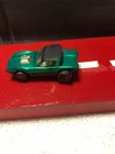 Hot Wheels Redline 1968 Python USA w/ White interior, Black roof, Metallic Green