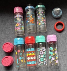 Vtg Lot 7 Decorated Baby Bottles 4 Evenflo + 2 Cherubs + 1 Playtex Drop In 8 Oz