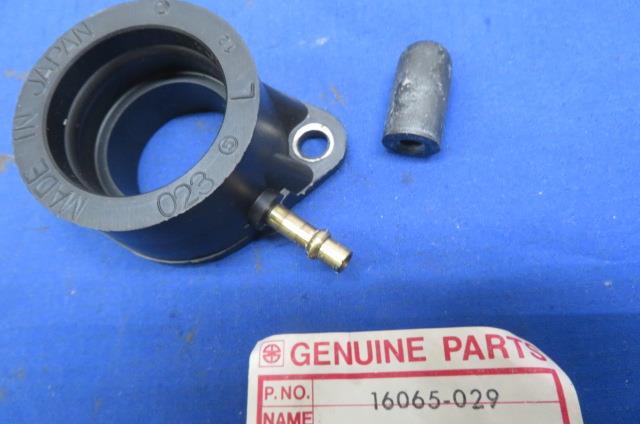 NOS Kawasaki # 16065-029 Left Carburetor Holder Z1 KZ KZ1000 KZ900