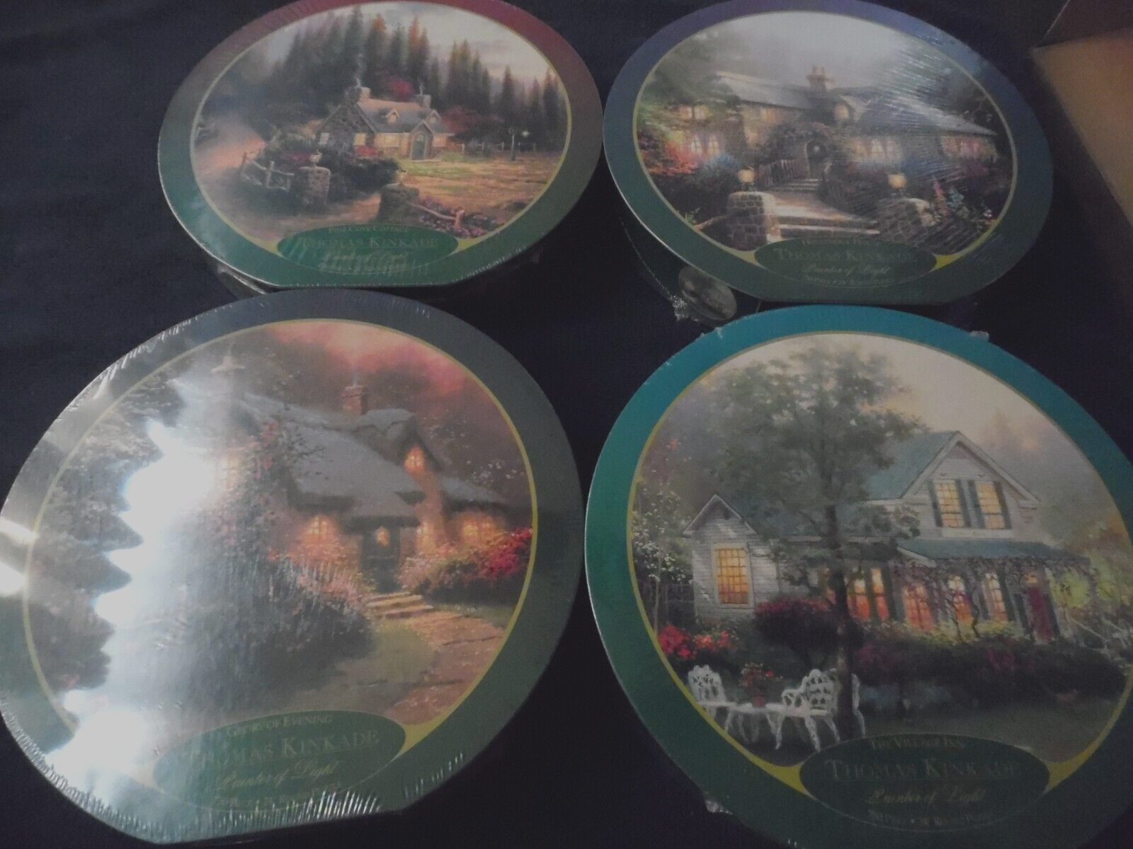 Lot of 4 New Thomas Kincade 750 Piece Round Jigsaw Puzzles