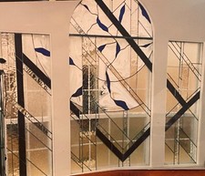 stain glass window panels white blue and black lines with semi circle top 