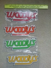 Woodys traction products vinyl decal (Red or Green)