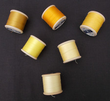 6 x VINTAGE DEWHURST SYLKO PLASTIC COTTON REELS - SHADES OF YELLOW