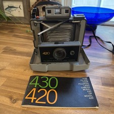 Vintage 70s Folding Polaroid 420 Automatic Land Camera w/ Hard Cover And Book