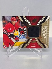 21-22 Joey Keane /99 #RJ-JK Carolina Hurricanes SPx Rookie Jersey Spectrum