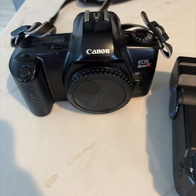 (i) Canon EOS Rebel X Film Camera w/ f Quantaray flash 