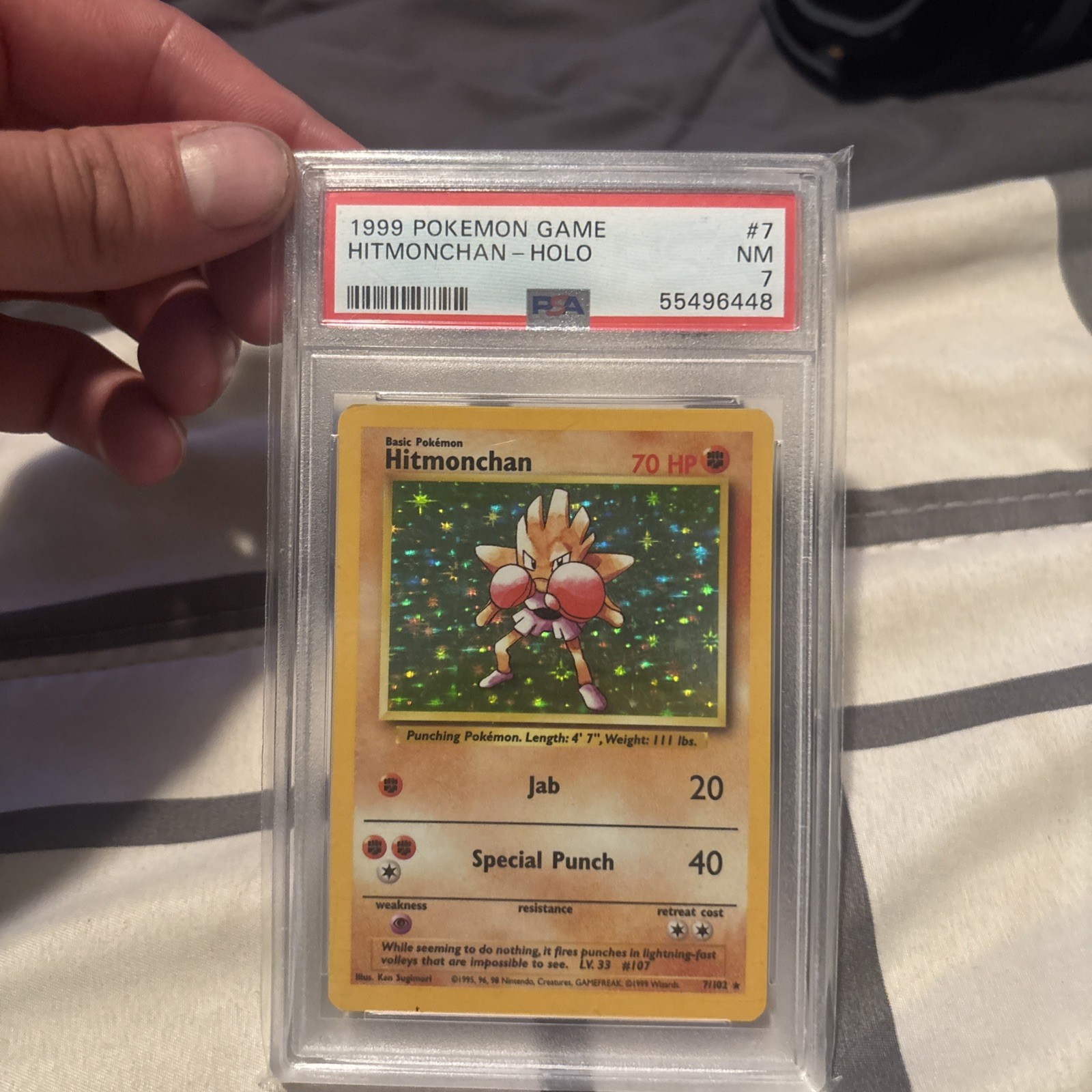 1999 Pokemon Base Hitmonchan Holo 7/102 PSA 7 NM
