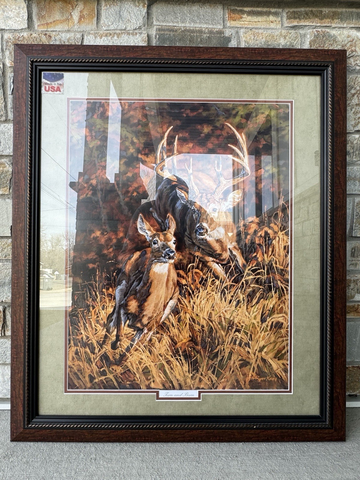 “Turn and Burn” by Ryan Kirby.  Framed print.Signed twice by the artist.