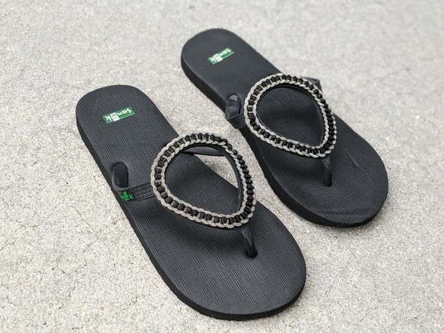 black jeweled flip flops