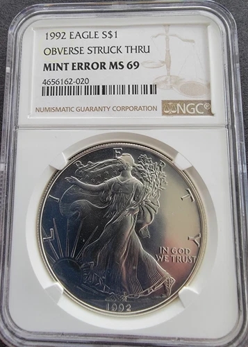 1992 Silver Eagle $1 NGC MS69 MINT ERROR Obverse Struck
