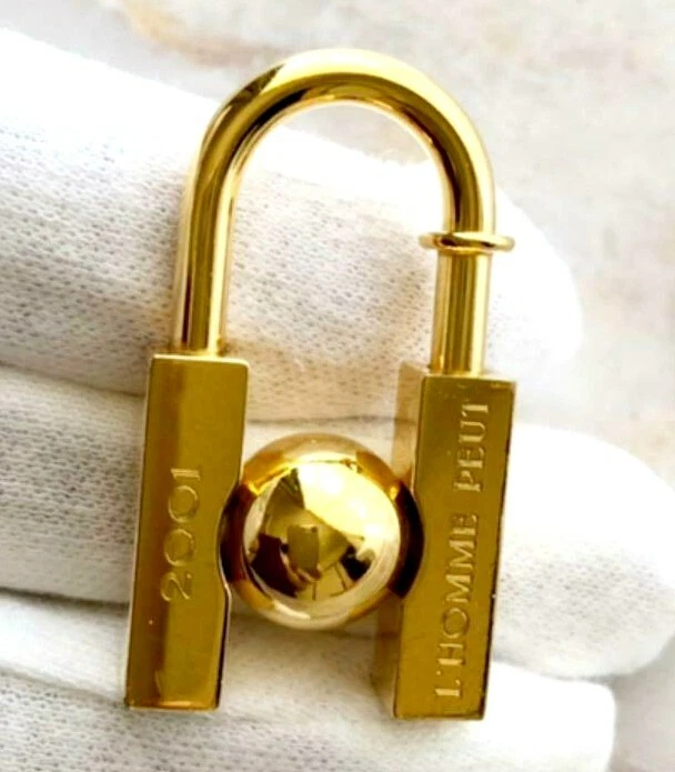 Authentic HERMES Gold Cadena Earth Motif Charm Lock 2001 limited