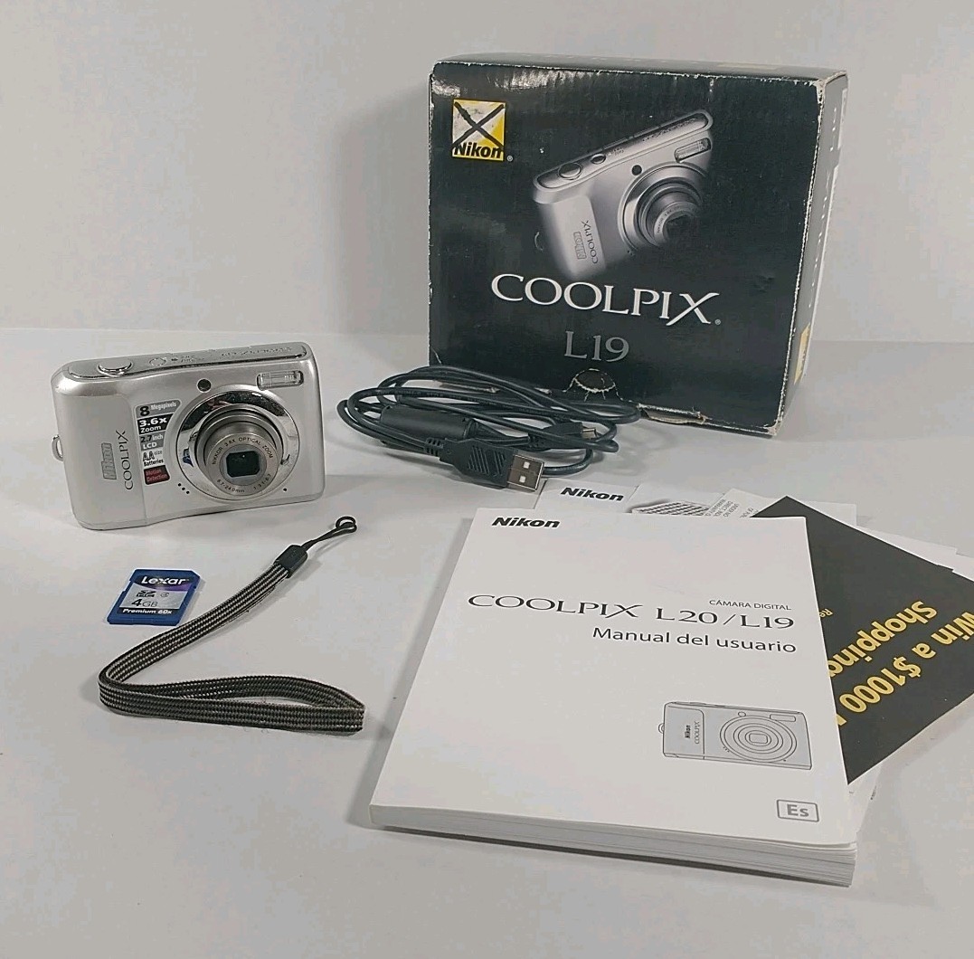 Nikon COOLPIX L19 8.0MP Digital Camera With SD Card Manual Strap