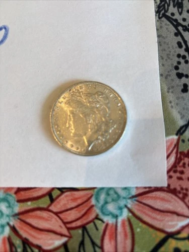 1886 Morgan Silver Dollar In Almost Uncirculated Condition